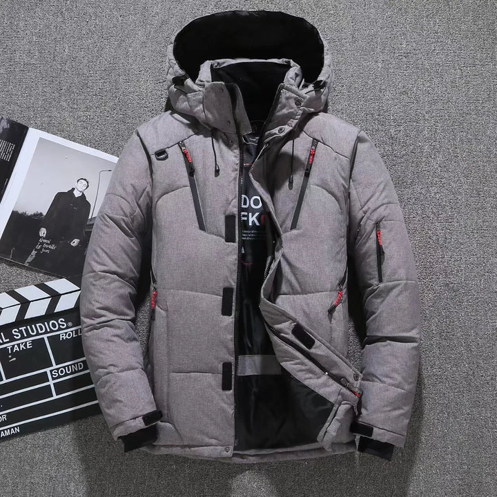 Gray winter jacket with black accents on a gray background